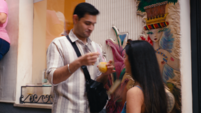 eating ice cream during pre wedding shoot in streets of positano 